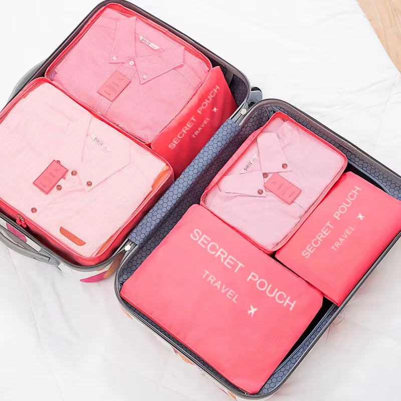 6-Piece Set of Waterproof Travel Storage Bags in Pink, Blue, and Grey - Large Capacity Luggage and Clothing Organizer with Zipper Closure